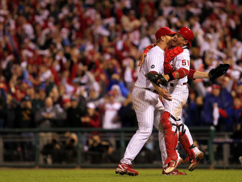 PHILADELPHIA – OCTOBER 06: Roy Halladay #34 and Carlos Ruiz #51 of the Philadelphia Phillies celebrate Halladay’s no-hitter and the win in Game 1 of the NLDS against the Cincinnati Reds at Citizens Bank Park on October 6, 2010 in Philadelphia, Pennsylvania. The Phillies defeated the Reds 4-0. (Photo by Chris Trotman/Getty Images)