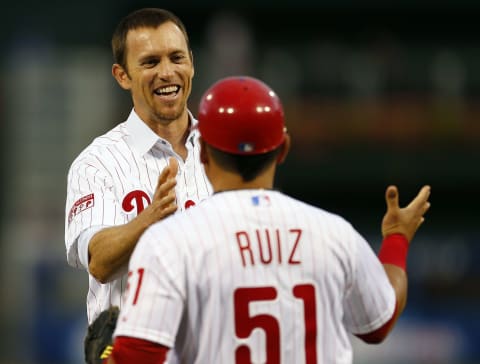 PHILADELPHIA, PA – AUGST 1: Former closer Brad Lidge of the Philadelphia Phillies is congratulated by catcher Carlos Ruiz