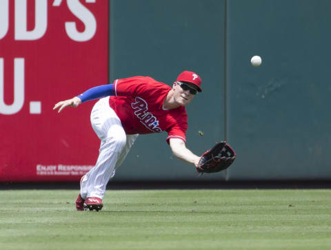 PHILADELPHIA, PA – JULY 6: Cody Asche #25 of the Philadelphia Phillies makes a diving catch in the top of the second inning against the Atlanta Braves at Citizens Bank Park on July 6, 2016 in Philadelphia, Pennsylvania. (Photo by Mitchell Leff/Getty Images)