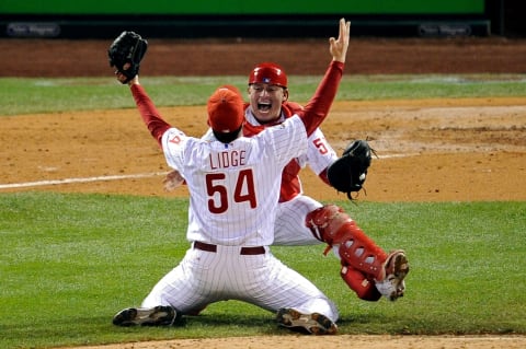 PHILADELPHIA – OCTOBER 29: Catcher Carlos Ruiz #51 and Brad Lidge #54 of the Philadelphia Phillies celebrate after recording the final out of their 4-3 win to win the World Series against the Tampa Bay Rays during the continuation of game five of the 2008 MLB World Series on October 29, 2008 at Citizens Bank Park in Philadelphia, Pennsylvania. (Photo by Jeff Zelevansky/Getty Images)