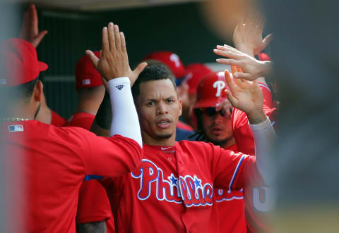 PHILADELPHIA, PA – SEPTEMBER 21: Cesar Hernandez #16 of the Philadelphia Phillies high-fives teammates after scoring in the fifth inning during a game against the Los Angeles Dodgers at Citizens Bank Park on September 21, 2017 in Philadelphia, Pennsylvania. (Photo by Hunter Martin/Getty Images)