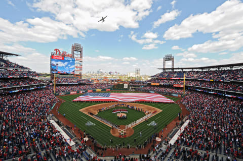 PHILADELPHIA, PA – APRIL 09: A C-130 does a flyover during the national anthem before the game between the Miami Marlins and Philadelphia Phillies during the home opener at Citizens Bank Park on April 9, 2012 in Philadelphia, Pennsylvania. (Photo by Drew Hallowell/Getty Images)