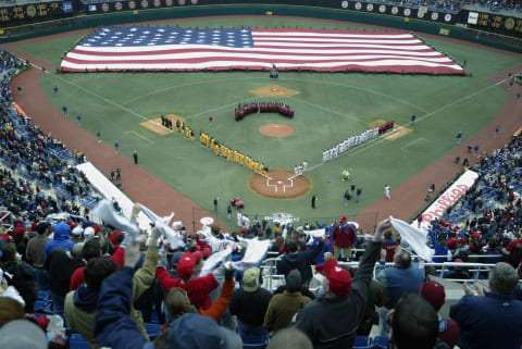 PHILADELPHIA – APRIL 4: Philadelphia Phillies fans celebrate introductions of their team against the Pittsburgh Pirates on the last opening day at Veterans Stadium on April 4, 2003 in Philadelphia, Pennsylvania. The Pirates defeated the Phillies 9-1. (Photo by Al Bello/Getty Images)