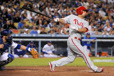 LOS ANGELES, CA – OCTOBER 13: Shane Victorino #8 of the Philadelphia Phillies swings at a pitch against the Los Angeles Dodgers during game Game Four of the National League Championship Series during the 2008 MLB playoffs on October 13, 2008 at Dodger Stadium in Los Angeles, California. (Photo by Harry How/Getty Images)