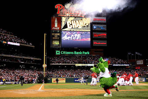 PHILADELPHIA – OCTOBER 29: The Philly Phanatic runs on the field as the Philadelphia Phillies pile up on top of closing pitcher Brad Lidge after they won 4-3 wo win the World Series against the Tampa Bay Rays during the continuation of game five of the 2008 MLB World Series on October 29, 2008 at Citizens Bank Park in Philadelphia, Pennsylvania. (Photo by Jed Jacobsohn/Getty Images)