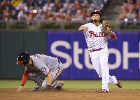 PHILADELPHIA, PA – SEPTEMBER 27: Freddy Galvis #13 of the Philadelphia Phillies turns a double play against Trea Turner #7 of the Washington Nationals in the top of the third inning at Citizens Bank Park on September 27, 2017 in Philadelphia, Pennsylvania. (Photo by Mitchell Leff/Getty Images)