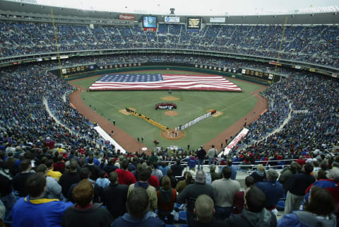 PHILADELPHIA – APRIL 4: Fans stand at attention during the national anthem before the home opener between the Philadelphia Phillies and the Pittsburgh Pirates at Veterans Stadium on April 4, 2003 in Philadelphia, Pennsylvania. The Pirates defeated the Phillies 9-1. (Photo by Al Bello/Getty Images)