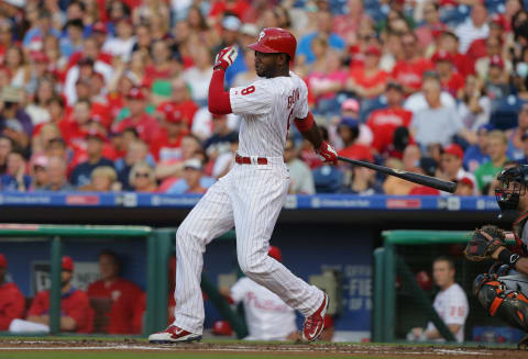 PHILADELPHIA, PA – JULY 18: Domonic Brown #9 of the Philadelphia Phillies hits an RBI single in the first inning during a game against the Miami Marlins at Citizens Bank Park on July 18, 2015 in Philadelphia, Pennsylvania. (Photo by Hunter Martin/Getty Images)