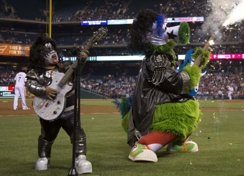 PHILADELPHIA, PA – JUNE 3: The Phillie Phanatic performs with a KISS cover band in between the fifth and sixth inning of the game between the Milwaukee Brewers and Philadelphia Phillies at Citizens Bank Park on June 3, 2016 in Philadelphia, Pennsylvania. The Phillies defeated the Brewers 6-3. (Photo by Mitchell Leff/Getty Images)