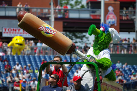 PHILADELPHIA, PA – JUNE 20: The Phillie Phanatic launches Hatfield hotdogs into the stands between innings during a game between the Philadelphia Phillies and the Arizona Diamondbacks at Citizens Bank Park on June 20, 2016 in Philadelphia, Pennsylvania. The Diamondbacks won 3-1. (Photo by Hunter Martin/Getty Images)