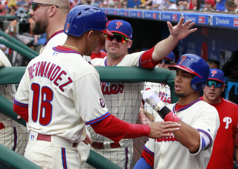 PHILADELPHIA, PA – JUNE 04: Cesar Hernandez #16 of the Philadelphia Phillies is congratulated by teammates after scoring on a double by Odubel Herrera #37 during the first inning against the San Francisco Giants in a game at Citizens Bank Park on June 4, 2017 in Philadelphia, Pennsylvania. (Photo by Rich Schultz/Getty Images)