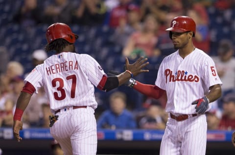 PHILADELPHIA, PA – SEPTEMBER 13: Odubel Herrera #37 of the Philadelphia Phillies high fives Nick Williams #5 after scoring a run in the bottom of the first inning against the Miami Marlins at Citizens Bank Park on September 13, 2017 in Philadelphia, Pennsylvania. (Photo by Mitchell Leff/Getty Images)