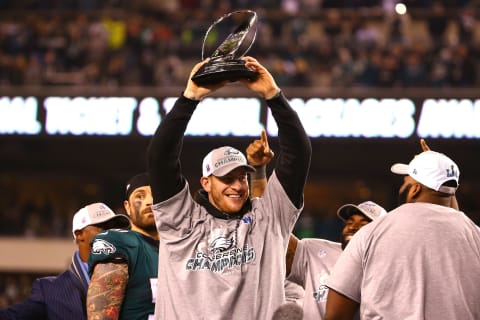 PHILADELPHIA, PA – JANUARY 21: Carson Wentz #11 of the Philadelphia Eagles holds the George Halas Trophy after his team defeated the Minnesota Vikings in the NFC Championship game at Lincoln Financial Field on January 21, 2018 in Philadelphia, Pennsylvania. The Philadelphia Eagles defeated the Minnesota Vikings 38-7. (Photo by Mitchell Leff/Getty Images)