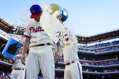 PHILADELPHIA, PA – JUNE 03: Tommy Joseph #19 (L) and Cameron Rupp #29 (R) of the Philadelphia Phillies douse Ben Lively #49 of the Philadelphia Phillies after the game on his performance at Citizens Bank Park on June 3, 2017 in Philadelphia, Pennsylvania. The Phillies won 5-3. (Photo by Corey Perrine/Getty Images)