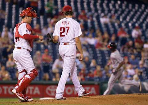 PHILADELPHIA, PA – SEPTEMBER 25: Andrew Knapp #34 of the Philadelphia Phillies talks to Aaron Nola #27 after a two run home run hit by Michael Taylor #3 of the Washington Nationals in the top of the second inning at Citizens Bank Park on September 25, 2017 in Philadelphia, Pennsylvania. (Photo by Mitchell Leff/Getty Images)