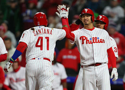 PHILADELPHIA, PA – APRIL 07: Carlos Santana #41 of the Philadelphia Phillies is congratulated by Vince Velasquez #28 after he hit a three-run home run during the fourth inning of a game against the Miami Marlins at Citizens Bank Park on April 7, 2018 in Philadelphia, Pennsylvania. (Photo by Rich Schultz/Getty Images)