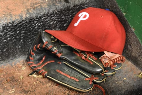 WASHINGTON, DC – SEPTEMBER 25: Philadelphia Phillies cap and glove in the dug out during a baseball game against the Washington Nationals at Nationals Park on September 25, 2015 in Washington, DC. The Phillies won 8-2. (Photo by Mitchell Layton/Getty Images)