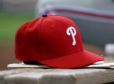 MILWAUKEE, WI – APRIL 24: A Philadelphia Phillies baseball hat sits in the dugout during the game against the Milwaukee Brewers at Miller Park on April 24, 2016 in Milwaukee, Wisconsin. (Photo by Dylan Buell/Getty Images) *** Local Caption ***