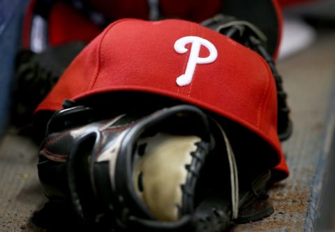 MILWAUKEE, WI – APRIL 24: A Philadelphia Phillies baseball hat sits in the dugout during the game against the Milwaukee Brewers at Miller Park on April 24, 2016 in Milwaukee, Wisconsin. (Photo by Dylan Buell/Getty Images) *** Local Caption ***