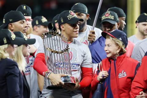 HOUSTON, TEXAS – OCTOBER 30: Juan Soto #22 of the Washington Nationals holds the Commissioners Trophy after defeating the Houston Astros 6-2 in Game Seven to win the 2019 World Series in Game Seven of the 2019 World Series at Minute Maid Park on October 30, 2019 in Houston, Texas. (Photo by Elsa/Getty Images)