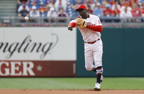 PHILADELPHIA, PENNSYLVANIA - JULY 02: Didi Gregorius #18 outfield the Philadelphia Phillies throws to first base during the first inning against the San Diego Padres at Citizens Bank Park on July 02, 2021 in Philadelphia, Pennsylvania. (Photo by Tim Nwachukwu/Getty Images)