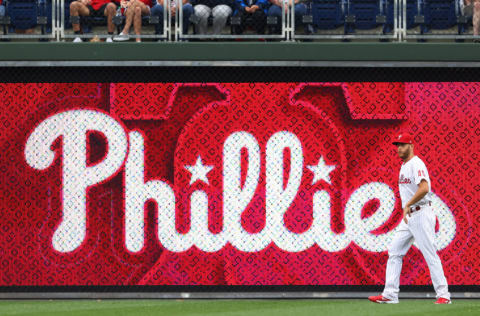 PHILADELPHIA, PA - JUNE 22: Starting pitcher Zack Wheeler #45 of the Philadelphia Phillies runs in the outfield before the start of a game against the Washington Nationals at Citizens Bank Park on June 22, 2021 in Philadelphia, Pennsylvania. (Photo by Rich Schultz/Getty Images)