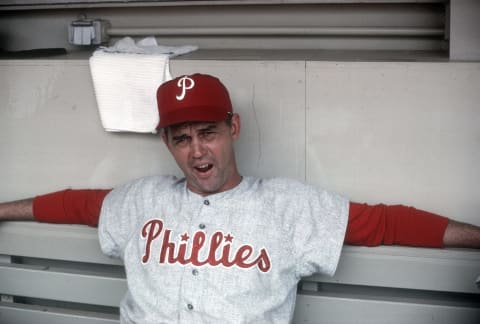 UNSPECIFIED – CIRCA 1964: Manager Gene Mauch #4 of Philadelphia Phillies looks on from the dugout during a Major League Baseball game circa 1964. Mauch managed the Phillies from 1960-68. (Photo by Focus on Sport/Getty Images)