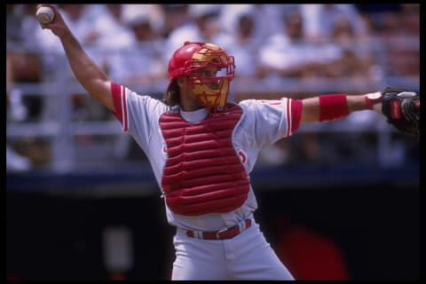 7 Jun 1995: Catcher Darren Daulton of the Philadelphia Phillies throws infield for an out against the San Diego Padres at Jack Murphy Stadium in San Diego, California.