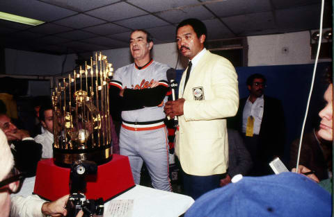 PHILADELPHIA, PA – OCTOBER 16: Joe Altobelli, manager of the Baltimore Orioles, Series MVP, is seen in the locker room with the World Series trophy after World Series game five between the Philadelphia Phillies and Baltimore Orioles on October 16, 1983 at Veterans Stadium in Philadelphia, Pennsylvania. The Orioles defeated the Phillies 5-0. (Photo by Rich Pilling/Getty Images)