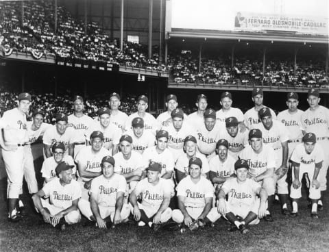 PHILADELPHIA – OCTOBER, 1950. The National League champion Philadelphia Phillies, the Whiz Kids, pose in Connie Mack Stadium in 1950. Hall of Famer Robin Roberts is standing, far left, and Richie Ashburn is seated in the front row, center. (Photo by Mark Rucker/Transcendental Graphics, Getty Images)