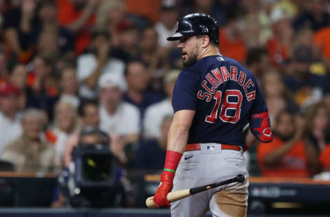 HOUSTON, TEXAS - OCTOBER 22: Kyle Schwarber #18 of the Boston Red Sox reacts after striking out against the Houston Astros during the third inning in Game Six of the American League Championship Series at Minute Maid Park on October 22, 2021 in Houston, Texas. (Photo by Elsa/Getty Images)