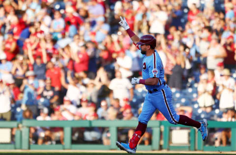 PHILADELPHIA, PA - JUNE 30: Kyle Schwarber #12 of the Philadelphia Phillies gestures as he rounds the bases after hitting a three run home run against the Atlanta Braves during the third inning of a game at Citizens Bank Park on June 30, 2022 in Philadelphia, Pennsylvania. (Photo by Rich Schultz/Getty Images)