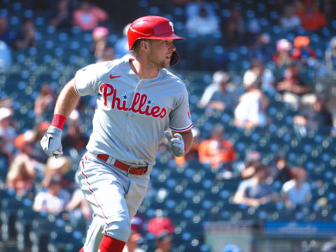 Jun 19, 2021; San Francisco, California, USA; Philadelphia Phillies first baseman Rhys Hoskins (17) follows the ball after hitting a three-run home run against the San Francisco Giants during the seventh inning at Oracle Park. Mandatory Credit: Kelley L Cox-USA TODAY Sports