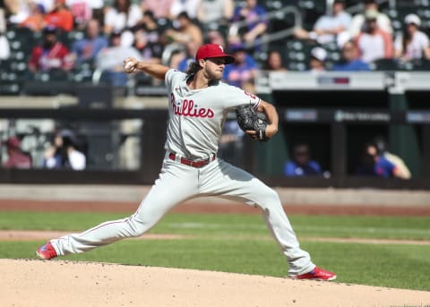 Jun 25, 2021; New York City, New York, USA; Philadelphia Phillies pitcher Aaron Nola (27) pitches in the first inning against the New York Mets at Citi Field. Mandatory Credit: Wendell Cruz-USA TODAY Sports