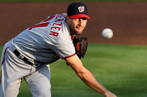 Apr 27, 2021; Dunedin, Florida, CAN; Washington Nationals pitcher Max Scherzer (31) throws a pitch during the first inning against the Toronto Blue Jays at TD Ballpark. Mandatory Credit: Jonathan Dyer-USA TODAY Sports