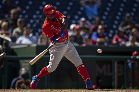 Sep 2, 2021; Washington, District of Columbia, USA; Philadelphia Phillies left fielder Andrew McCutchen (22) hits a three RBI double against the Washington Nationals during the sixth inning at Nationals Park. Mandatory Credit: Scott Taetsch-USA TODAY Sports