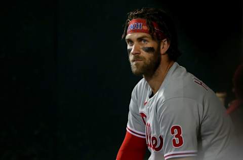 Sep 17, 2021; New York City, New York, USA; Philadelphia Phillies right fielder Bryce Harper (3) watches from the dugout during the third inning against the New York Mets at Citi Field. Mandatory Credit: Brad Penner-USA TODAY Sports