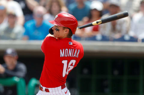 Mar 31, 2022; Clearwater, Florida, USA; Philadelphia Phillies center fielder Mickey Moniak (16) hits an rbi double against the New York Yankees in the third inning during spring training at BayCare Ballpark. Mandatory Credit: Nathan Ray Seebeck-USA TODAY Sports