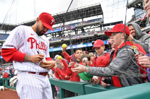 Apr 10, 2022; Philadelphia, Pennsylvania, USA; Philadelphia Phillies right fielder Nick Castellanos (8) signs autographs before game against the Oakland Athletics at Citizens Bank Park. Mandatory Credit: Eric Hartline-USA TODAY Sports