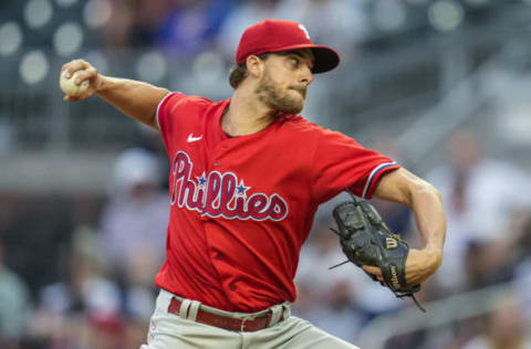 May 26, 2022; Cumberland, Georgia, USA; Philadelphia Phillies starting pitcher Aaron Nola (27) pitches against the Atlanta Braves during the first inning at Truist Park. Mandatory Credit: Dale Zanine-USA TODAY Sports