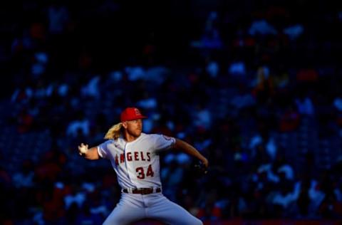 Jul 12, 2022; Anaheim, California, USA; Los Angeles Angels starting pitcher Noah Syndergaard (34) throws against the Houston Astros during the second inning at Angel Stadium. Mandatory Credit: Gary A. Vasquez-USA TODAY Sports