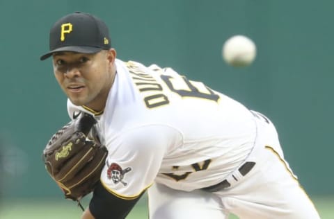 Jul 23, 2022; Pittsburgh, Pennsylvania, USA; Pittsburgh Pirates starting pitcher Jose Quintana (62) throws a warm-up pitch against the Miami Marlins during the first inning at PNC Park. Mandatory Credit: Charles LeClaire-USA TODAY Sports