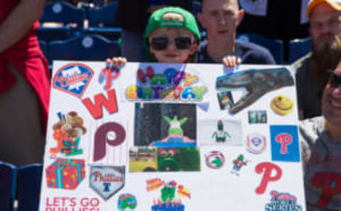 Apr 23, 2017; Philadelphia, PA, USA; A young fan holds a birthday sign for the Phillie Phanatic before a game between the Philadelphia Phillies and the Atlanta Braves at Citizens Bank Park. Mandatory Credit: Bill Streicher-USA TODAY Sports