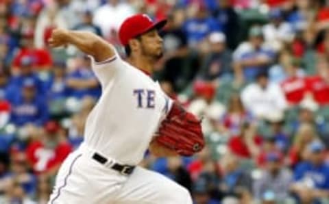 Apr 29, 2017; Arlington, TX, USA; Texas Rangers starting pitcher Yu Darvish (11) delivers to the plate in the first inning against the Los Angeles Angels at Globe Life Park in Arlington. Mandatory Credit: Ray Carlin-USA TODAY Sports