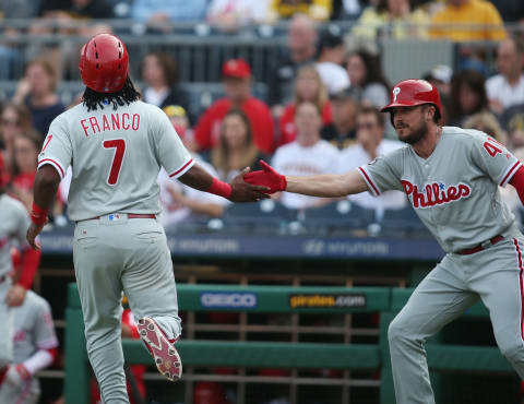 May 20, 2017; Pittsburgh, PA, USA; Philadelphia Phillies third baseman Maikel Franco (7) is greeted crossing home plate to score a run by pinch hitter Brock Stassi (41) during the seventh inning against the Pittsburgh Pirates at PNC Park. Mandatory Credit: Charles LeClaire-USA TODAY Sports