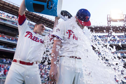 Jun 3, 2017; Philadelphia, PA, USA; Philadelphia Phillies starting pitcher Ben Lively (49) is doused with ice by first baseman Tommy Joseph (19) after a victory against the San Francisco Giants in his first MLB start at Citizens Bank Park. Mandatory Credit: Bill Streicher-USA TODAY Sports