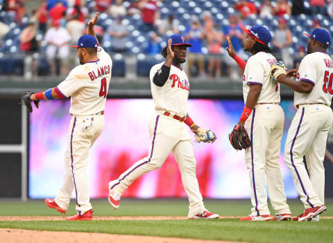 Jun 4, 2017; Philadelphia, PA, USA; Philadelphia Phillies third baseman Andres Blanco (4), center fielder Odubel Herrera (37), third baseman Maikel Franco (7) and relief pitcher Hector Neris (50) celebrates win against the San Francisco Giants at Citizens Bank Park. The Phillies won 9-7. Mandatory Credit: Eric Hartline-USA TODAY Sports