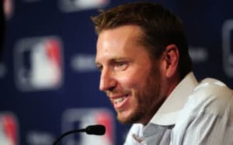 Dec 9, 2013; Orlando, FL, USA; Roy Halladay announces his retirement the MLB Winter Meetings at Walt Disney World Swan and Dolphin Resort. Halladay signed a one-day contract and retired with the Toronto Blue Jays. Mandatory Credit: David Manning-USA TODAY Sports