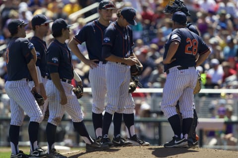 Jun 16, 2015; Omaha, NE, USA; Cal State Fullerton Titans pitcher Connor Seabold (260 looks down at the ball as he leaves the game against the LSU Tigers during the third inning in the 2015 College World Series at TD Ameritrade Park. Mandatory Credit: Bruce Thorson-USA TODAY Sports