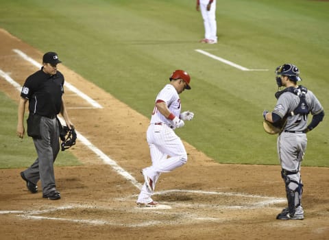 Jun 30, 2015; Philadelphia, PA, USA; Philadelphia Phillies catcher Carlos Ruiz (51) crosses home plate after hitting solo home run during the sixth inning against the Milwaukee Brewers at Citizens Bank Park. Mandatory Credit: Eric Hartline-USA TODAY Sports